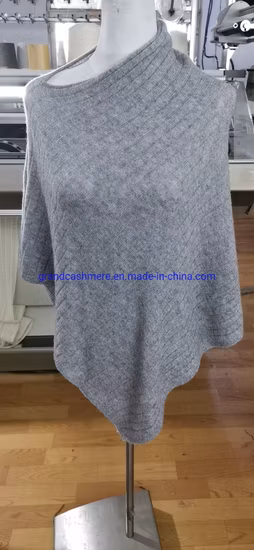 Poncho tricoté 30% cachemire 70% laine